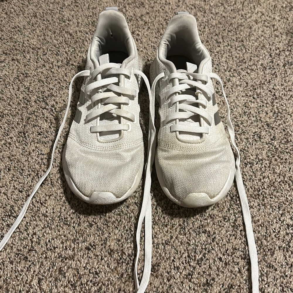 Women’s white adidas sneakers